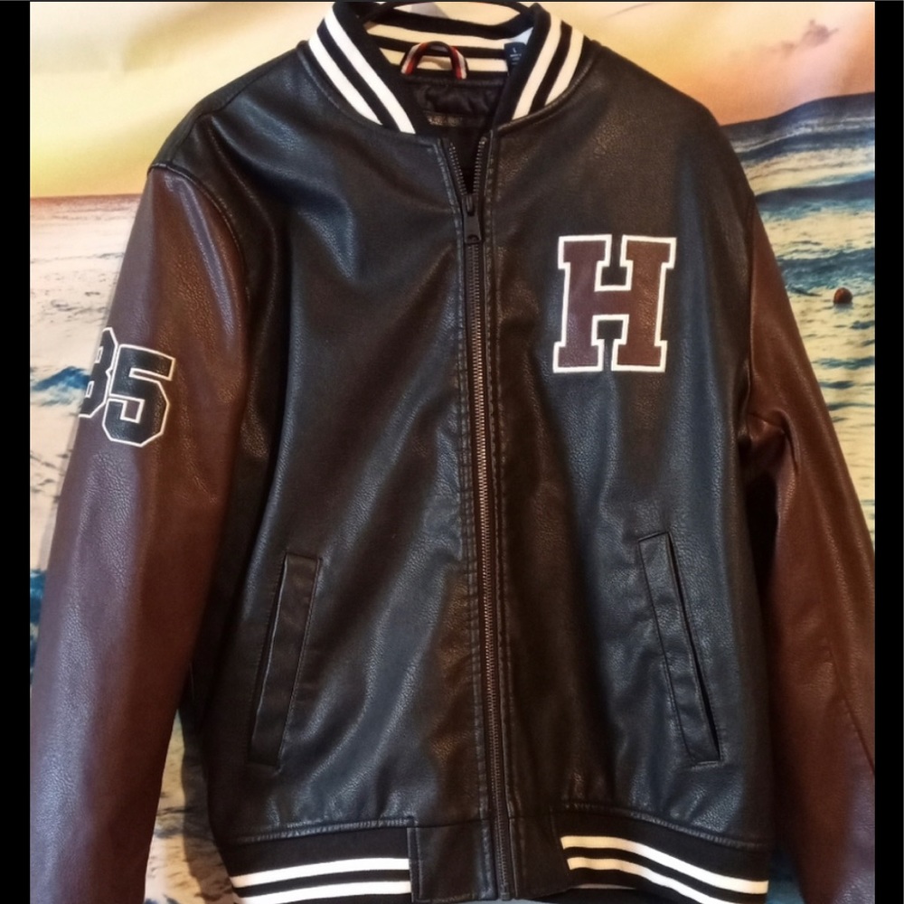 Tommy Hilfiger varsity jacket.  New with tags.  Size medium.